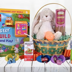 A classic Easter basket for kids including chocolate-filled plastic eggs, a plush bunny, juice box, an Easter Lego book, and lots more to keep them entertained!