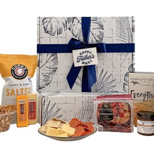 A hearty collection of gourmet meats, cheeses, nuts, crackers, and savory snacks—beautifully packaged and ready to enjoy. The perfect gift for Father's Day!