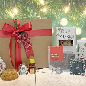 Holiday gift basket with a variety of tea and treats.