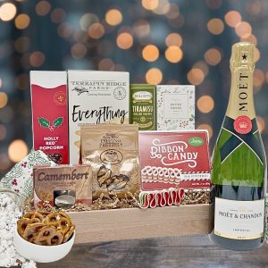 Our petite holiday gift basket filled with festive treats and a bottle of wine!