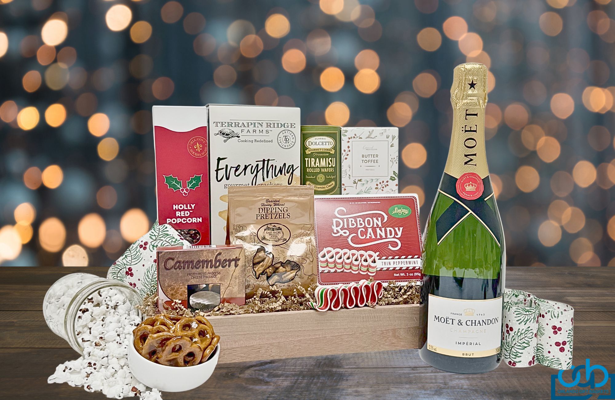 Our petite holiday gift basket filled with festive treats and a bottle of wine!
