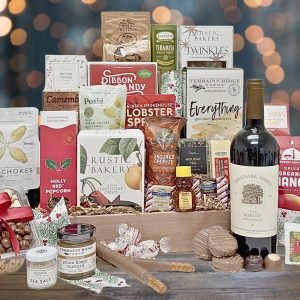 Our most indulgent holiday gift basket filled with sweet, savory, and indulgent treats with a bottle of wine!