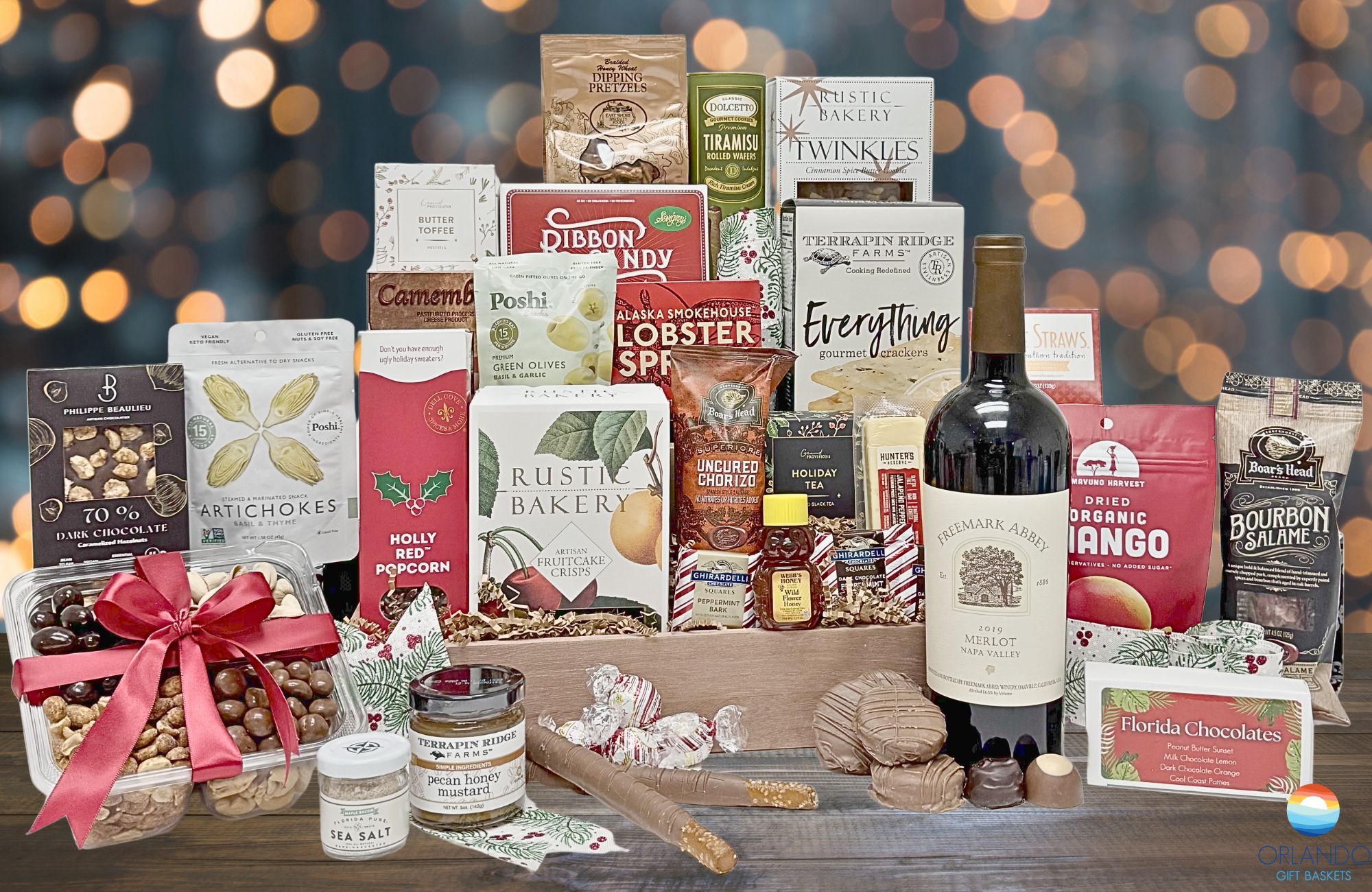 Our most indulgent holiday gift basket filled with sweet, savory, and indulgent treats with a bottle of wine!