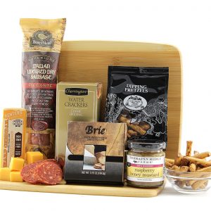Assorted hearty and savory snacks delivered on a cutting board.