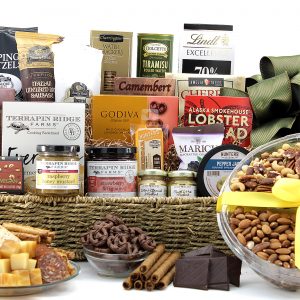 Large gift basket filled with a wide variety of cheeses, meats, chocolates, nuts, dips, and lots more!