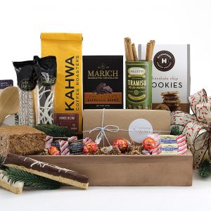 Variety of coffee, chocolate, and coffee flavored treats packaged in one large gift basket.