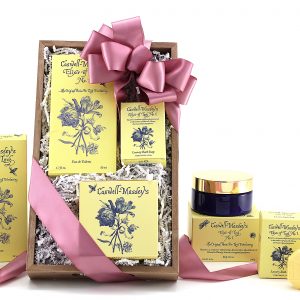 Gift basket of self-care products for her. All products from the "Elixir Of Love" collection from Caswell - Massey.