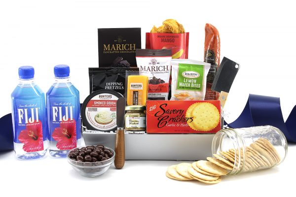 Gift basket designed with hotel life in mind! Travel friendly snacks and bottled water.