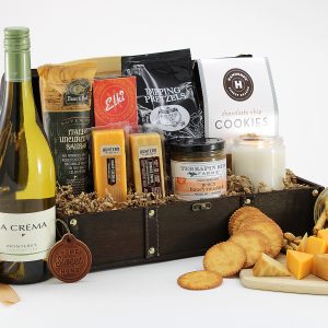 A lovely gift basket of goodies, keepsakes, and wine for a new home owner.