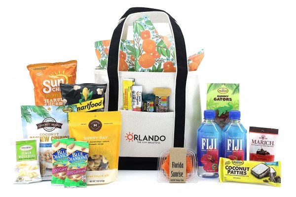 Our exclusive "ORLANDO" canvas tote bag filled with travel-friendly (and theme park friendly!) snacks