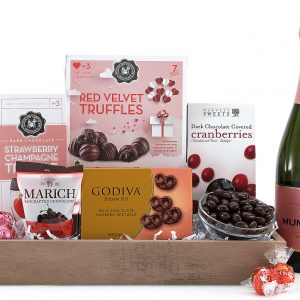 Valentine's Day gift basket filled with chocolatey treats and a bottle of wine!