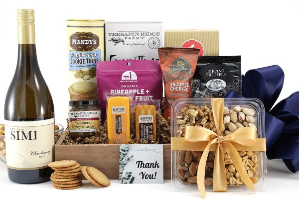 A gourmet gift basket with a bottle of wine and a message of gratitude!