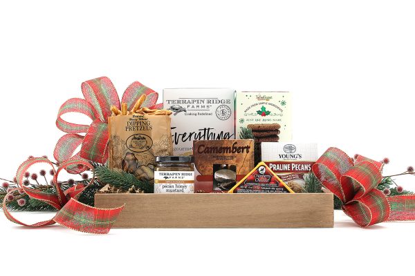 A perfectly sized gift basket full of gourmet goodies and a touch of holiday flair!