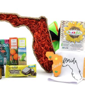 A basket shaped like the iconic state of Florida is filled with Florida-inspired treats!