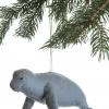 Felt manatee ornament with a string attached. Approximately 7" long.
