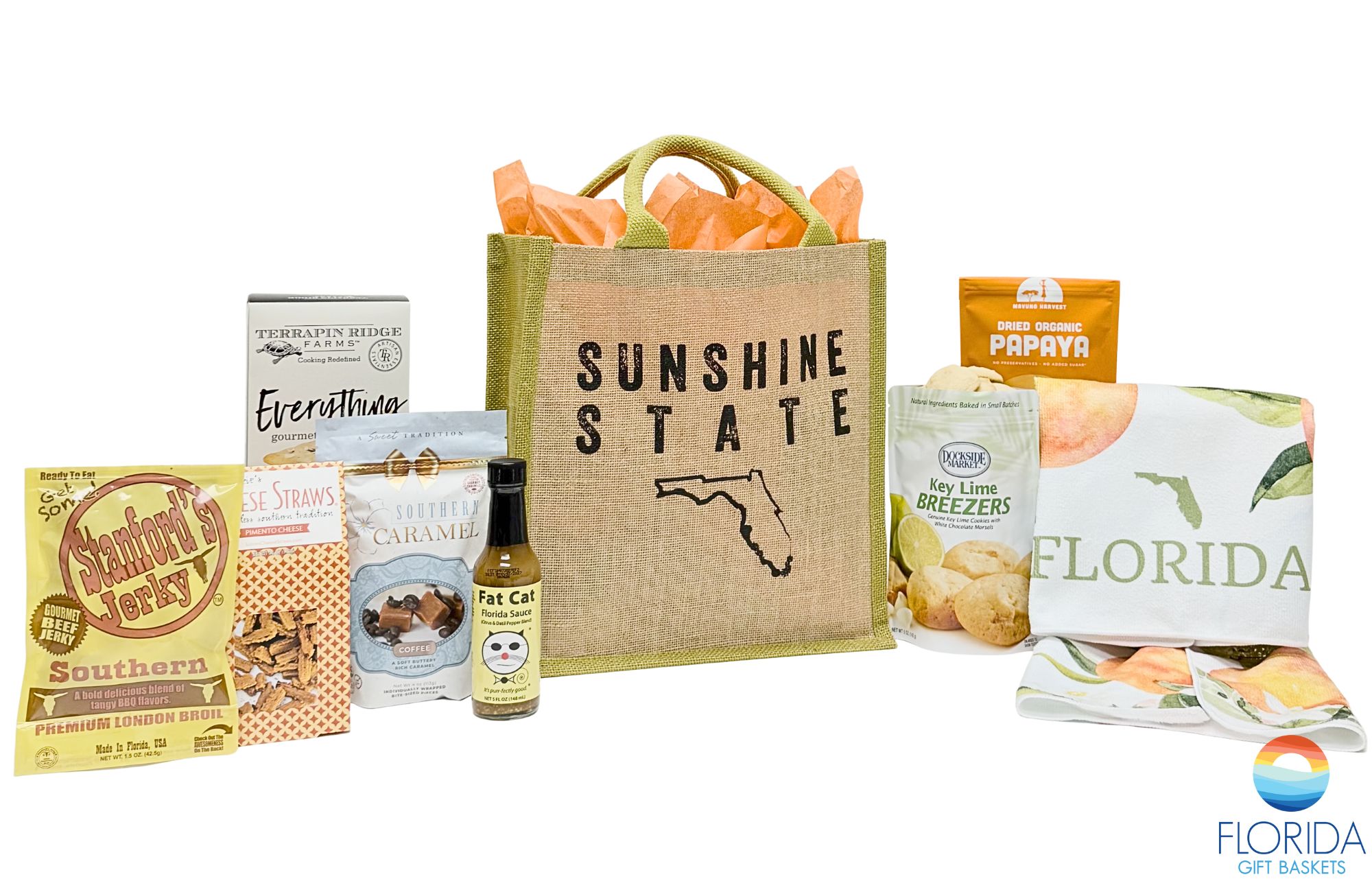 Send greetings from the sunny state of Florida! This gift tote sends the perfect combination of sweet, salty, and keepsakes.